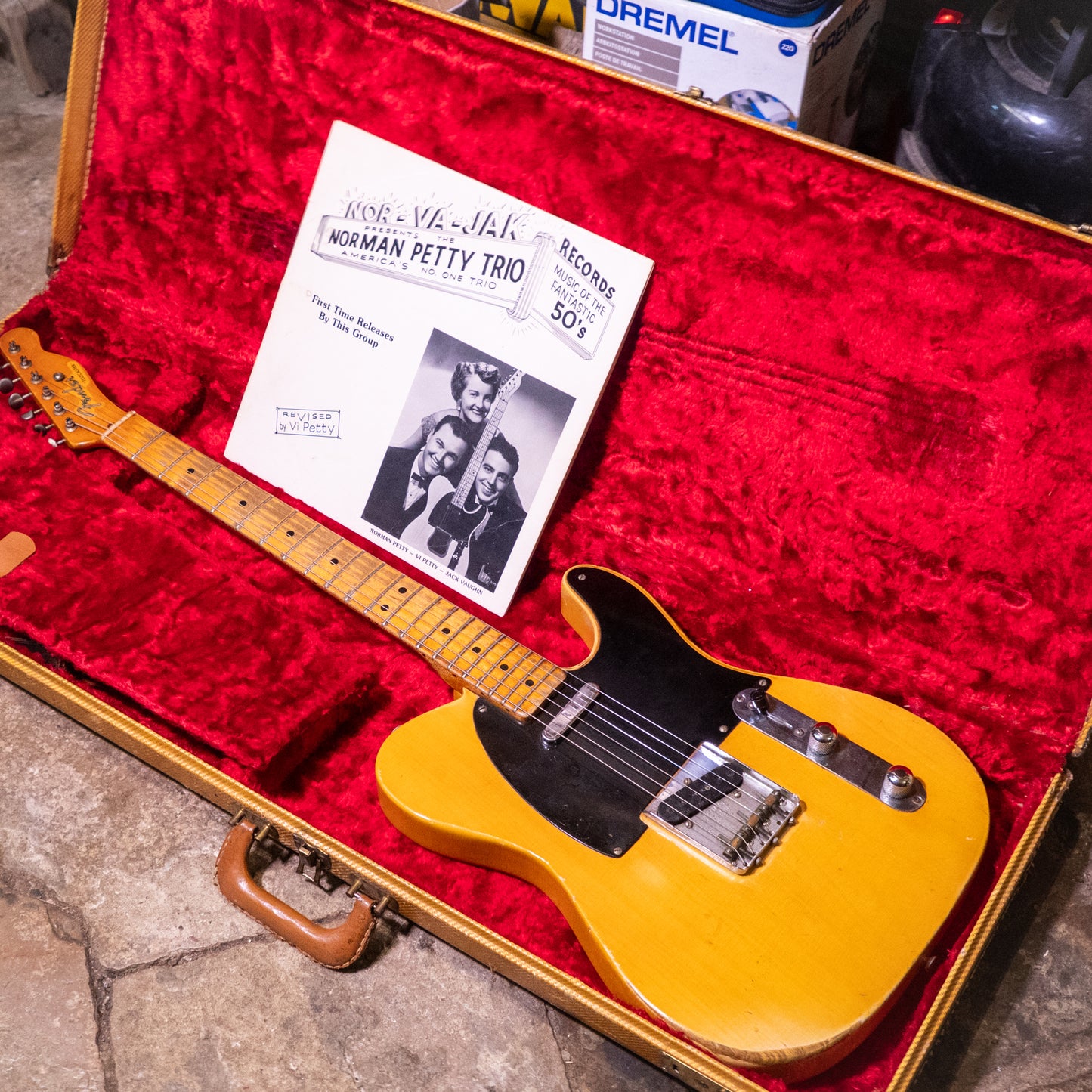 vintage 1952 Fender Telecaster electric guitar in original case with album