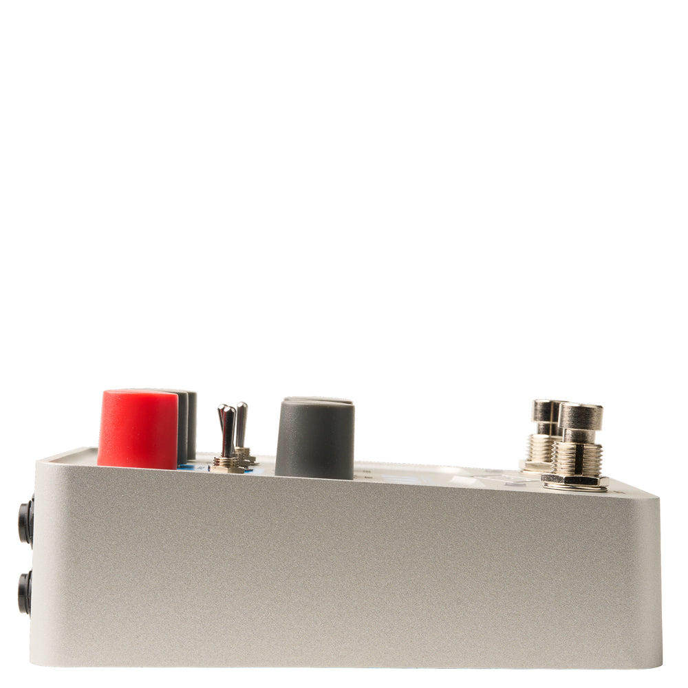 side view of a Universal Audio UAFX Max Preamp & Dual Compressor Pedal in silver metal
