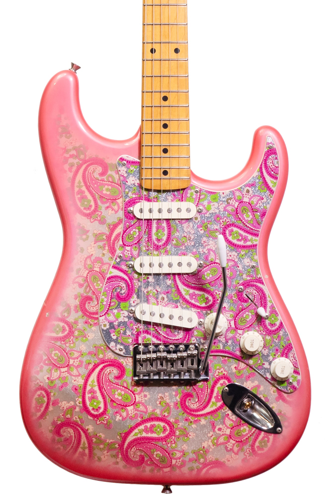 closeup of a 1999 Fender Stratocaster Reissue pink Paisley guitar MIJ