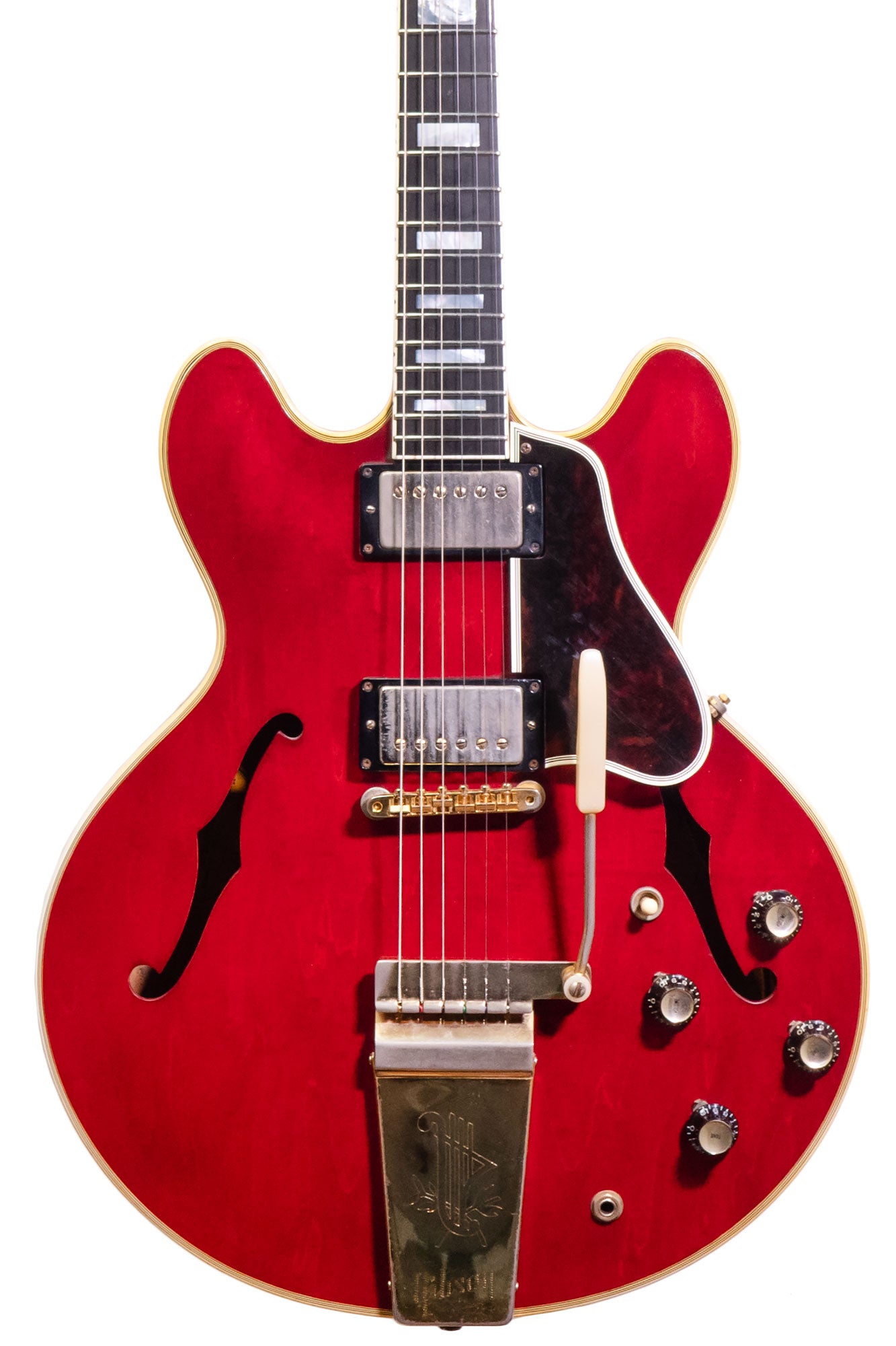 closeup of a Vintage 1965 Gibson ES-355 electric guitar in cherry red