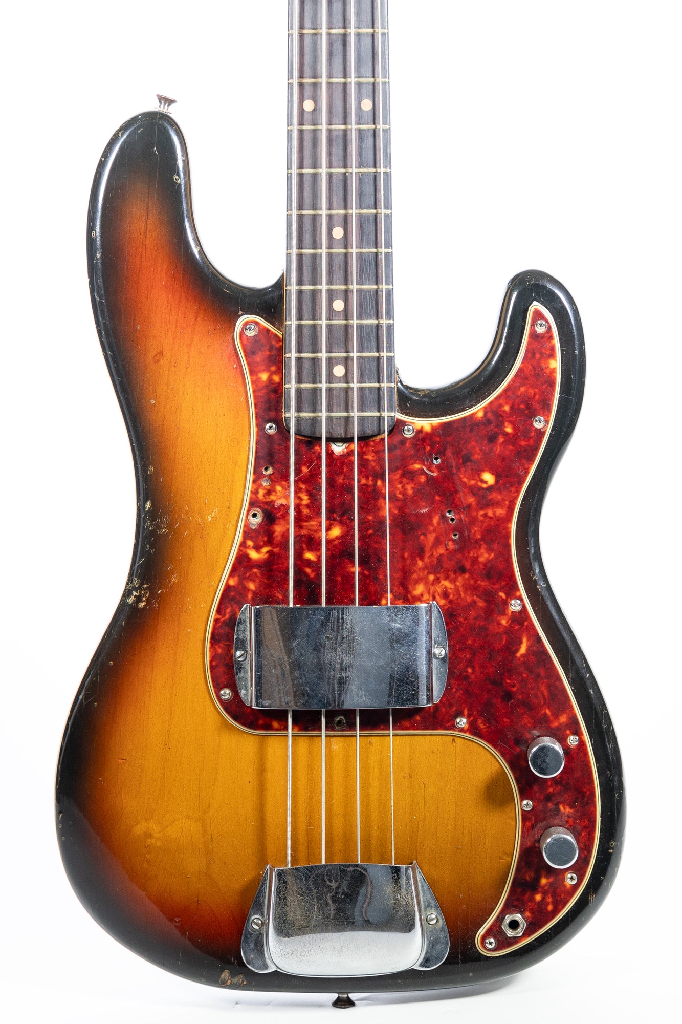 body front of a 1962 Fender Precision Bass, sunburst finish and tortoiseshell pickguard