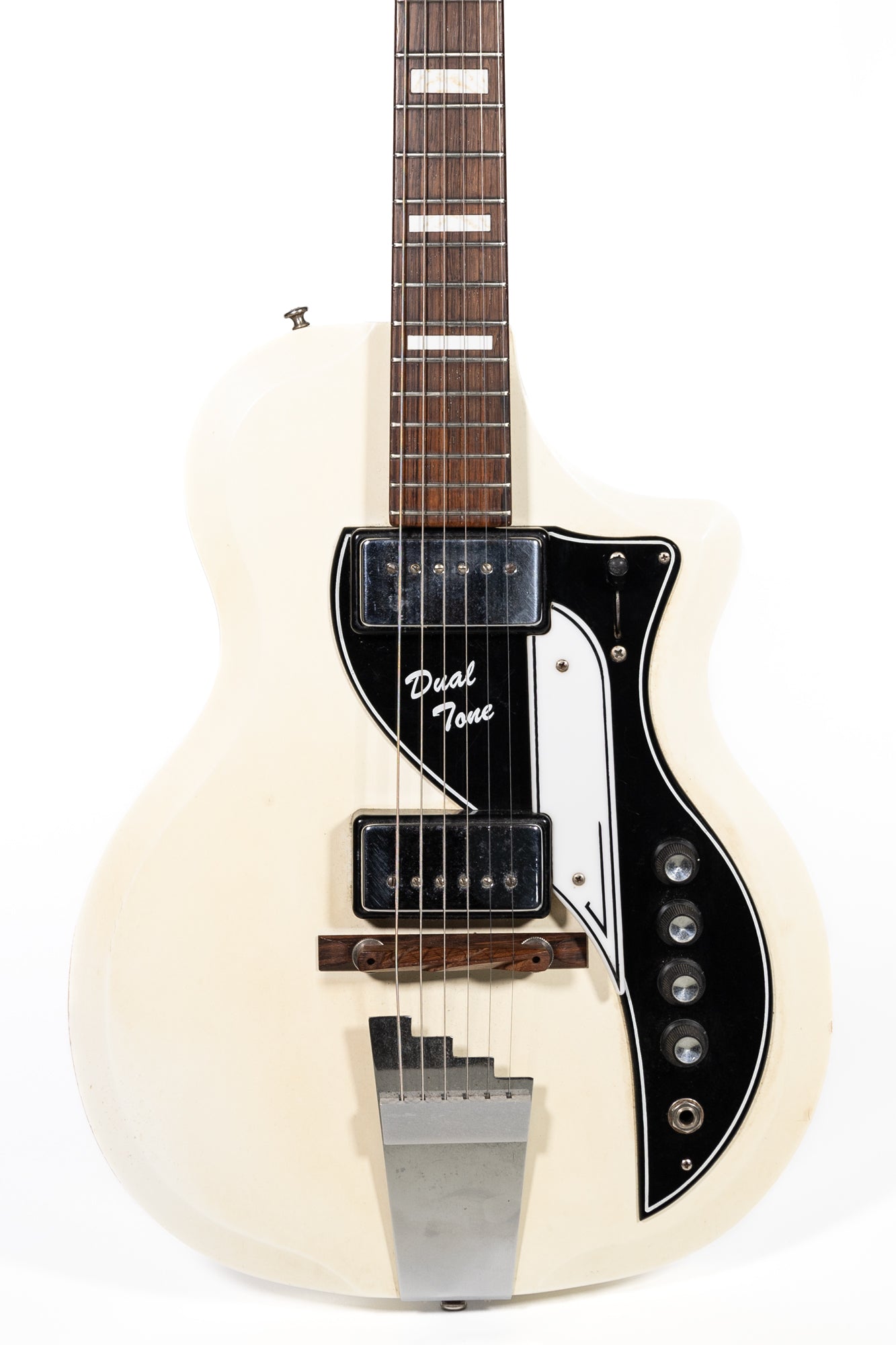 closeup of a Vintage 1961 Supro Dual Tone electric guitar