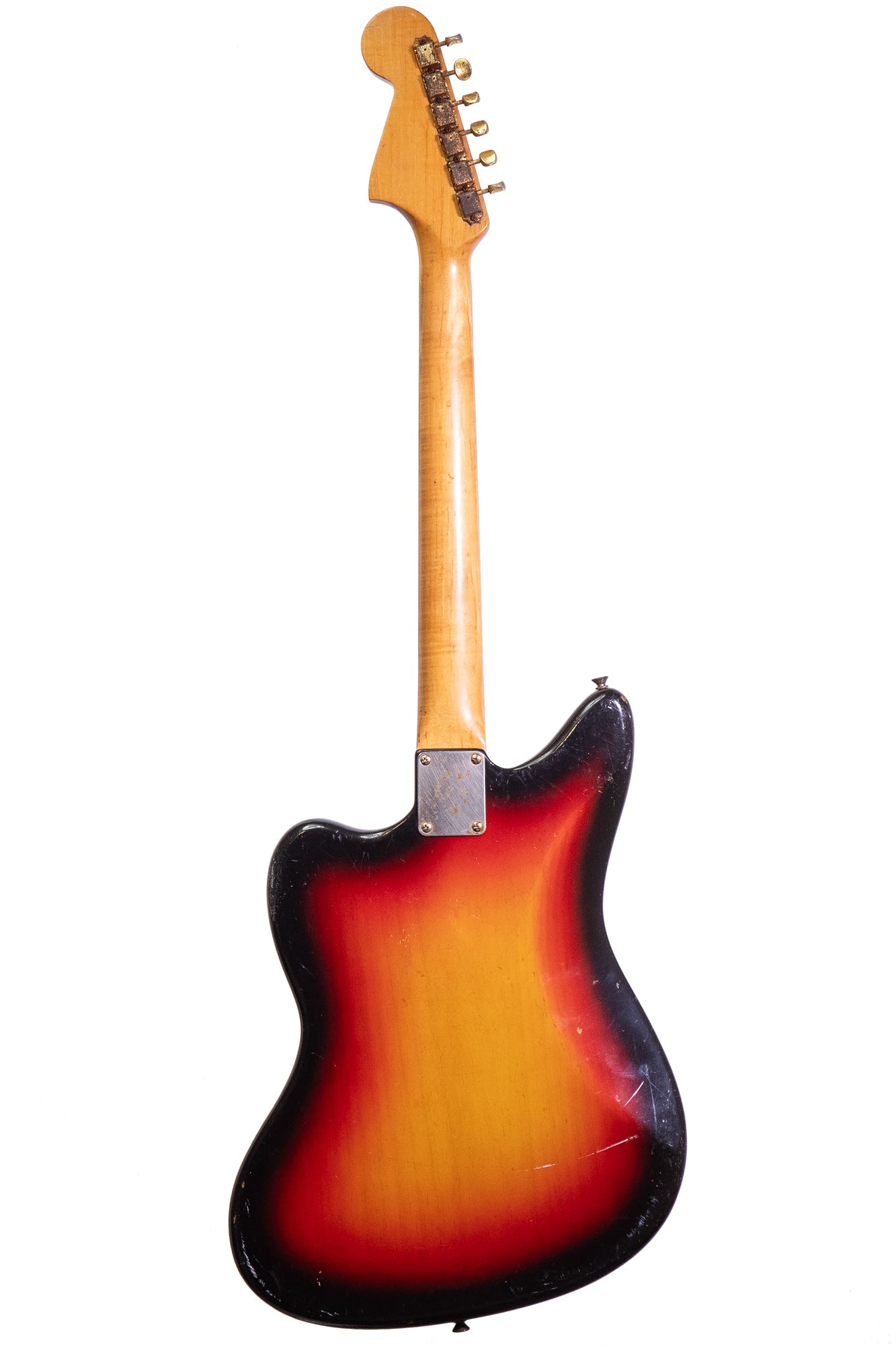 back of a Vintage 1965 Fender Jaguar original electric guitar in sunburst