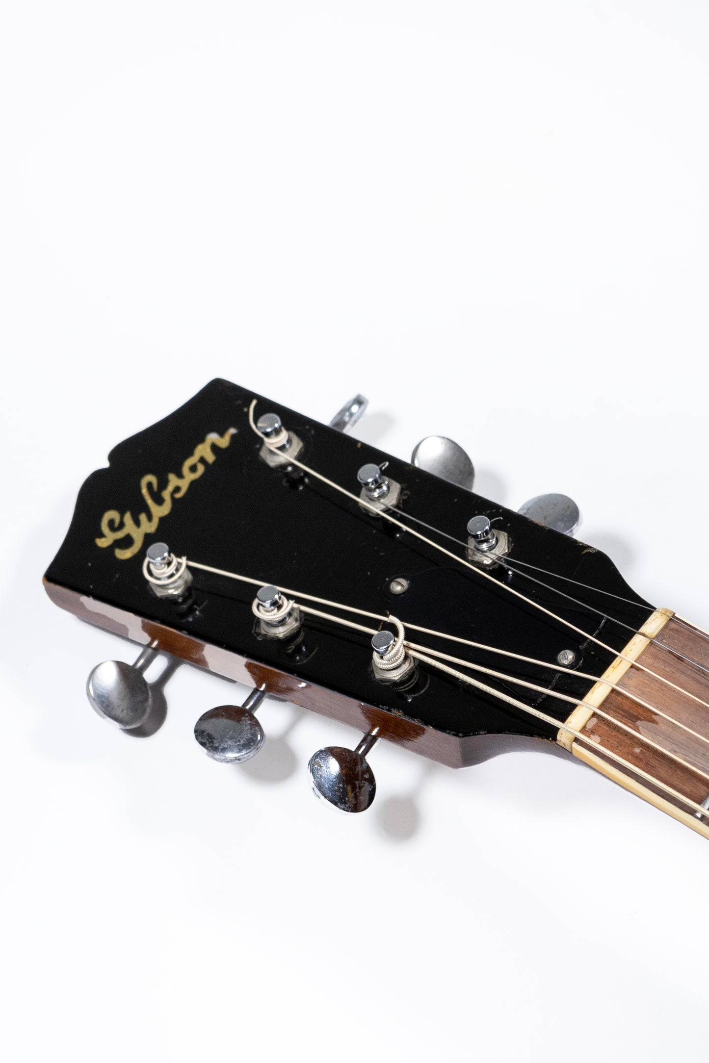 headstock from a Vintage 1941 Gibson J-55 Acoustic guitar