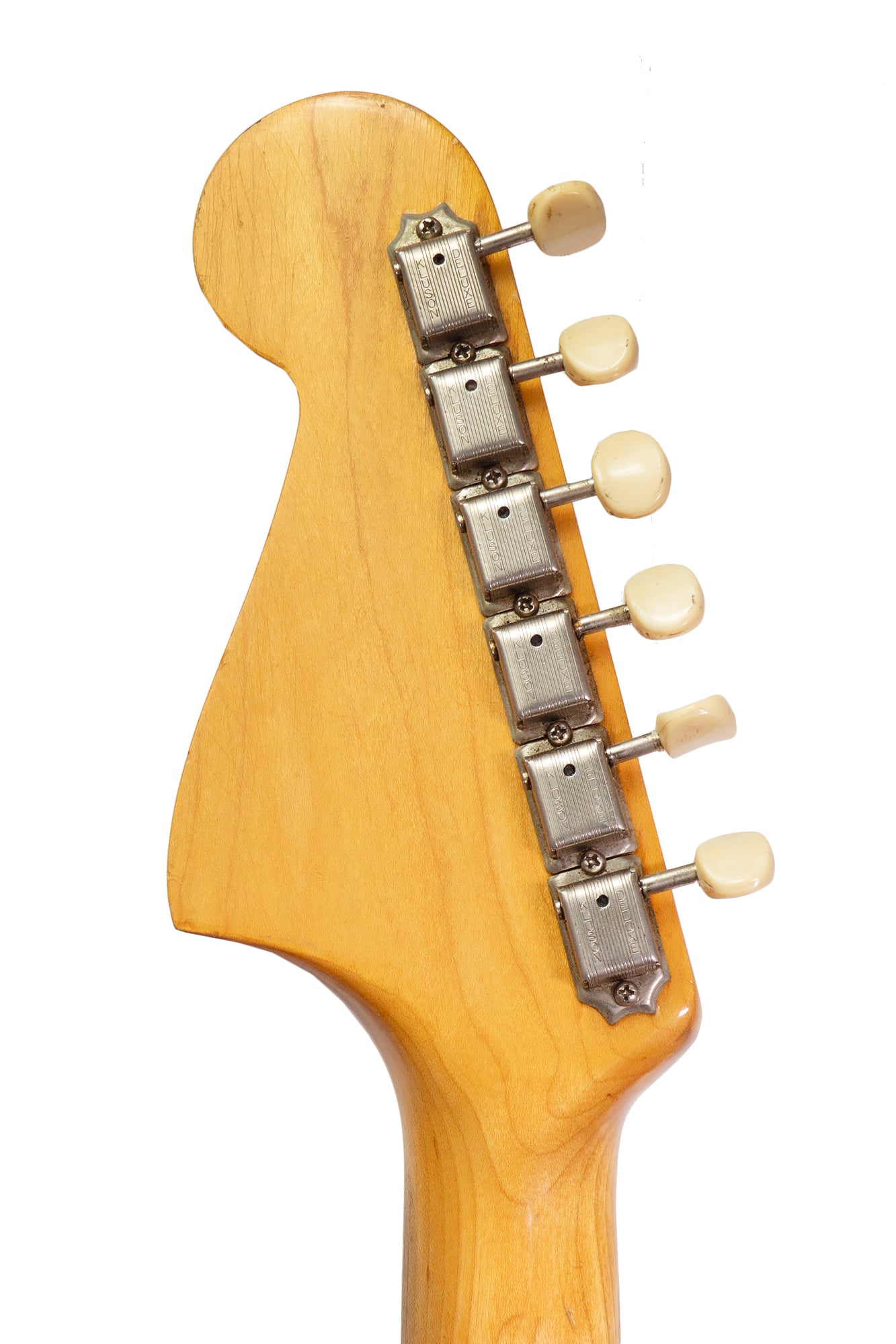 tuners form a vintage 1965 Fender Mustang electric guitar in white