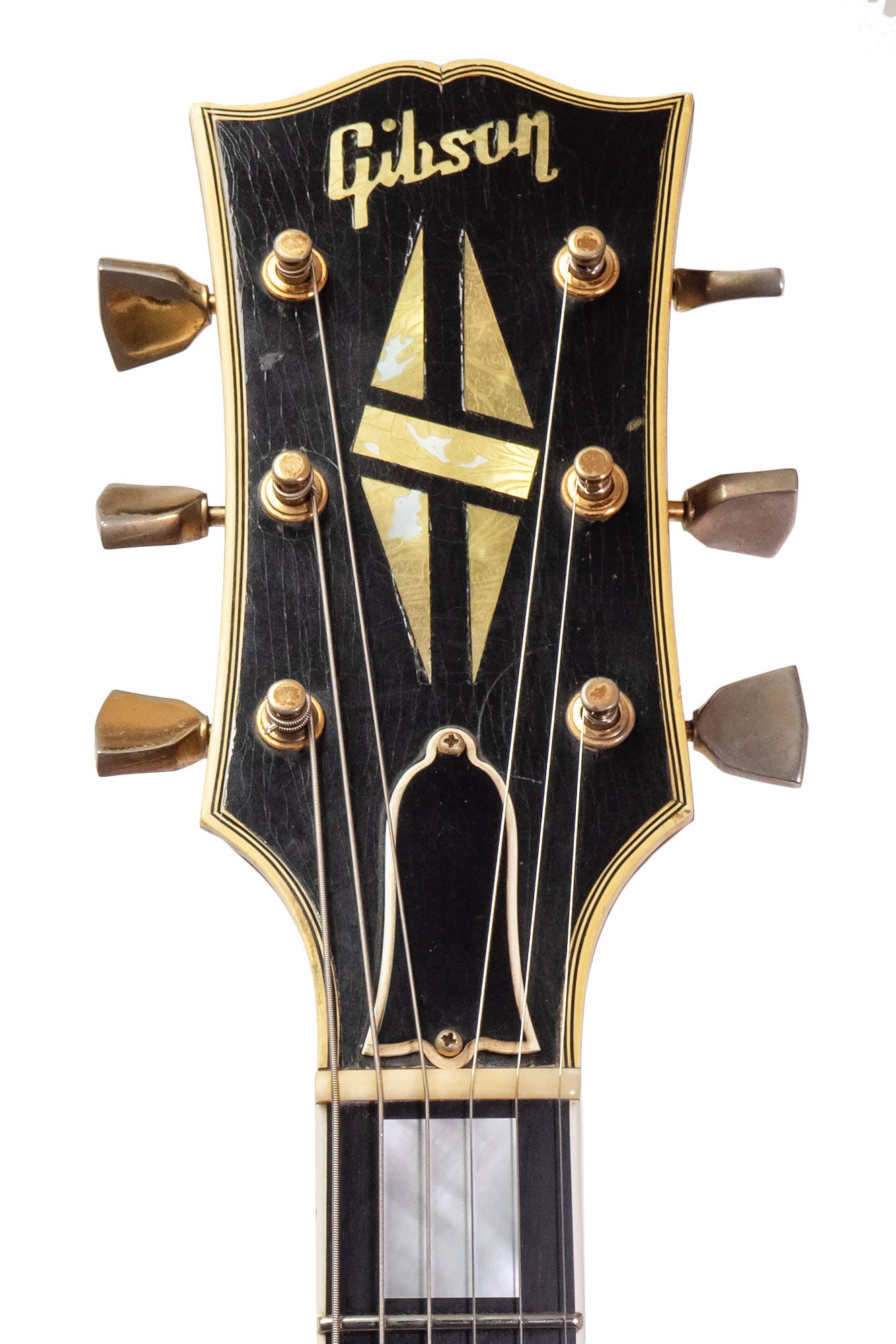 headstock from a Vintage 1965 Gibson ES-355 electric guitar in cherry red