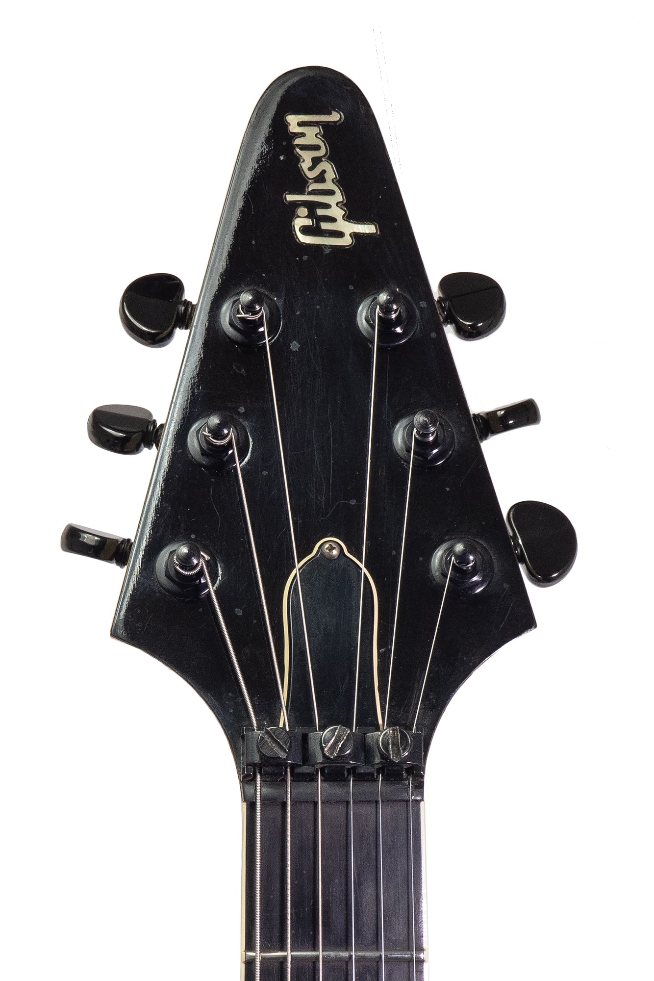 headstock from a vintage 1988 Gibson Flying V'90 electric guitar
