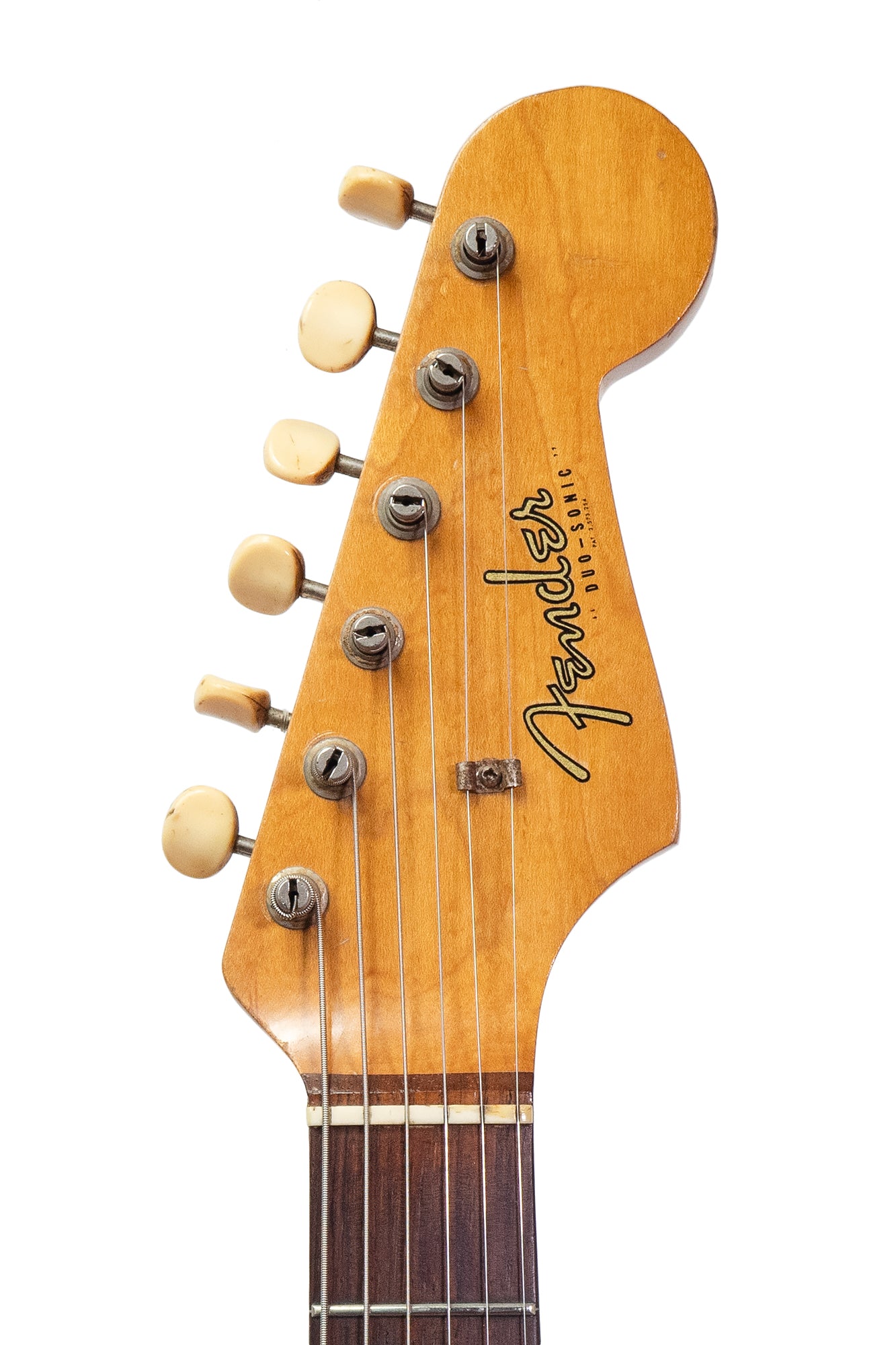 headstock from a Vintage 1963 Fender Duo Sonic electric guitar in blue
