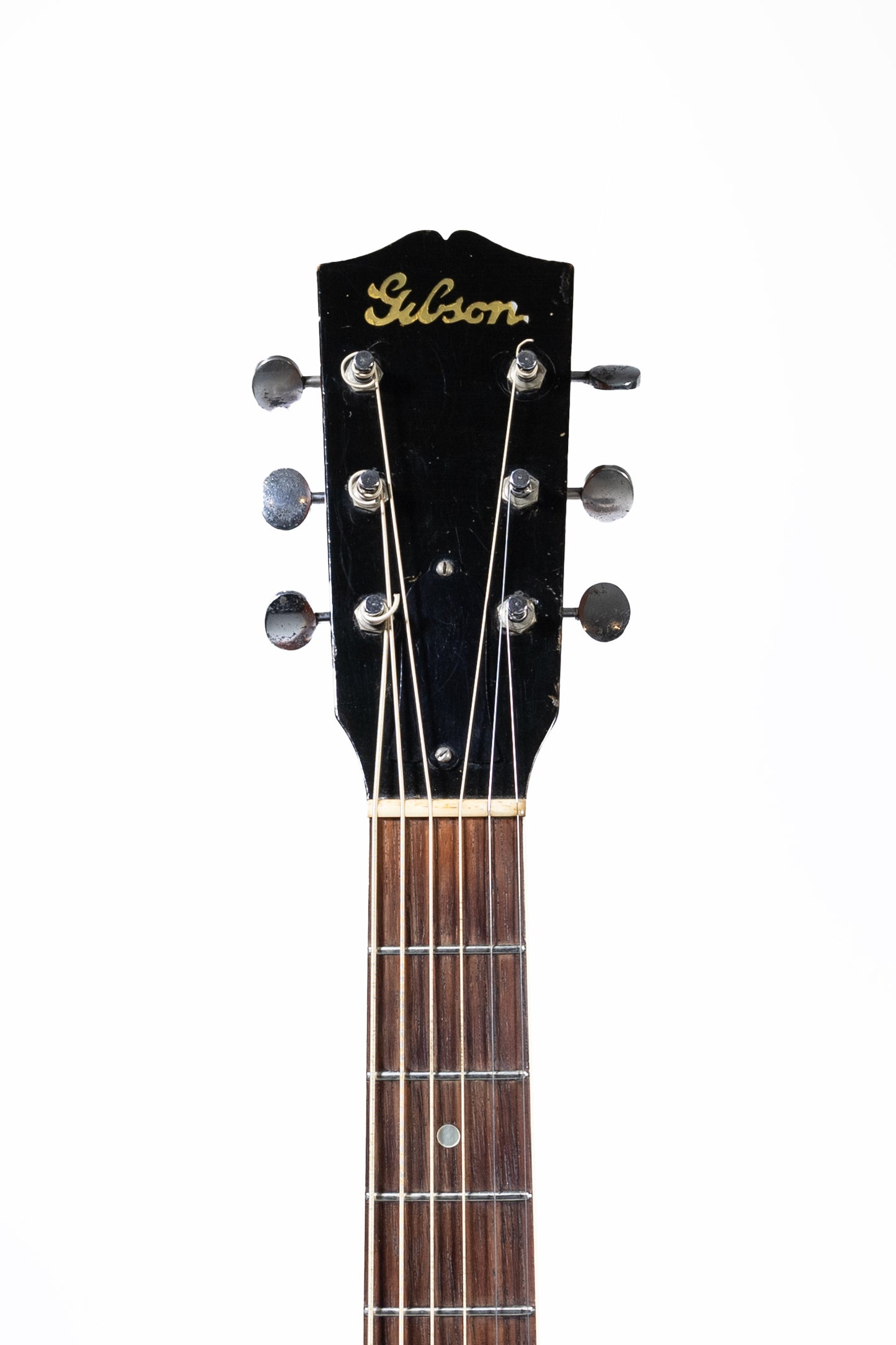 headstock and neck from a Vintage 1941 Gibson J-55 Acoustic guitar