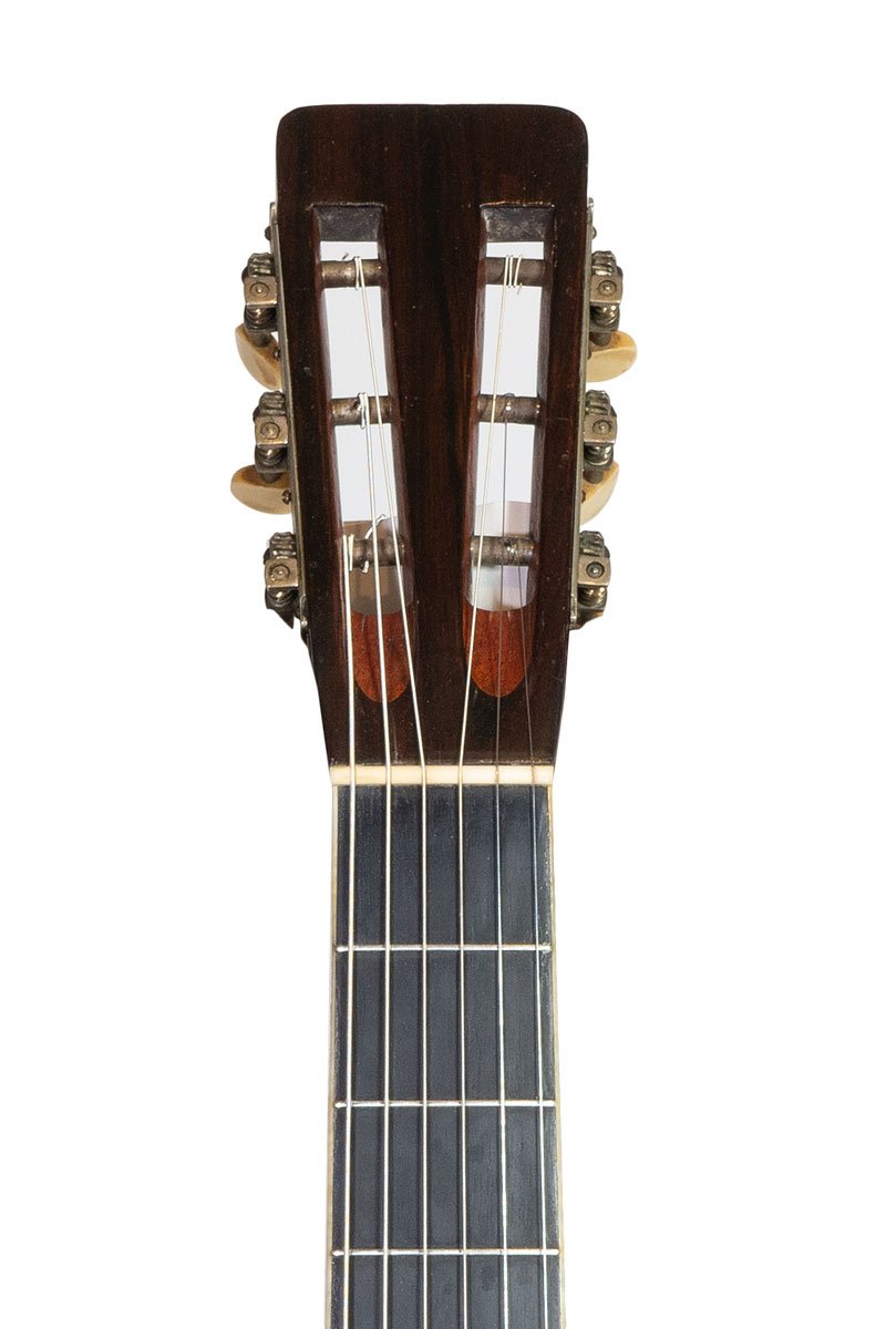 Close up of Pre-war 1903 Martin 0-30 acoustic guitar headstock
