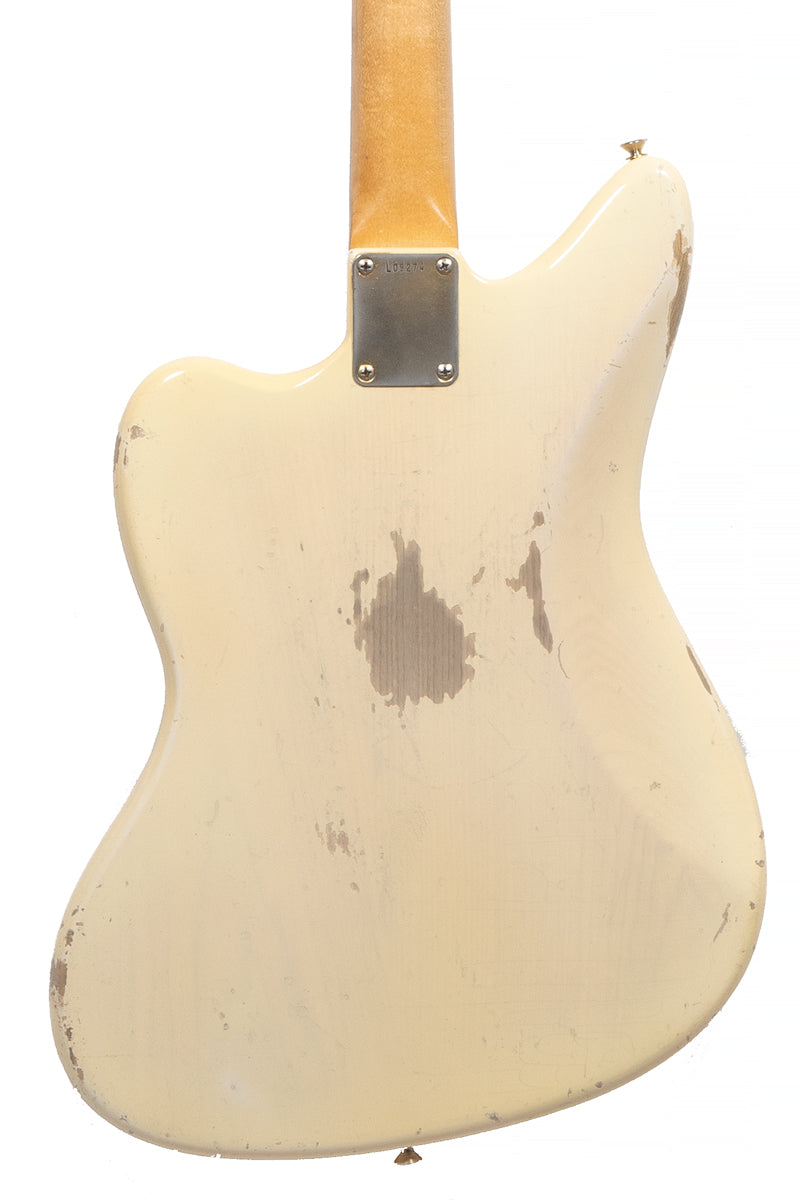 back of a Vintage 1963 Fender Jaguar electric guitar in white