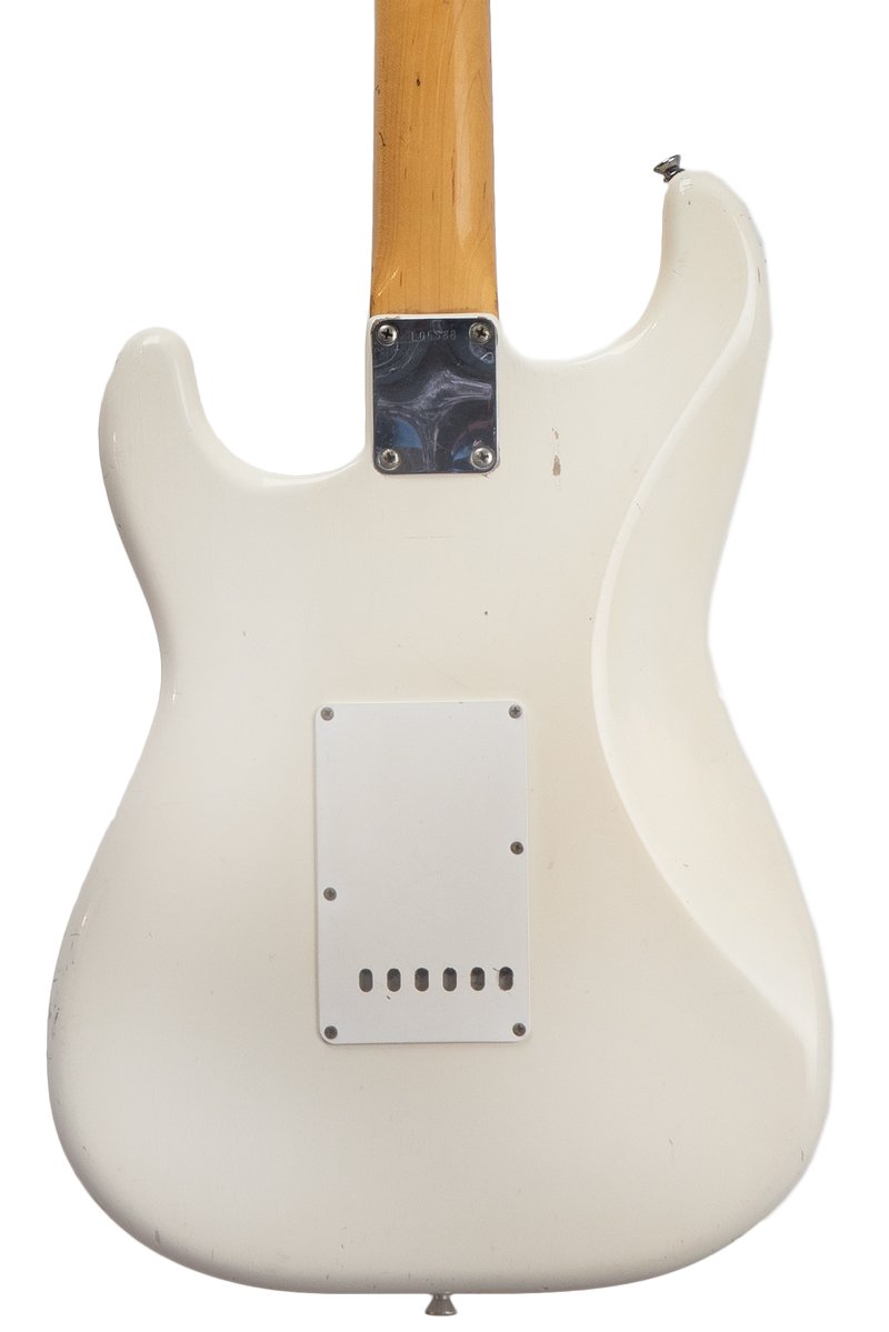 closeup of the back of a original vintage 1963 Fender Stratocaster - Olympic White electric guitar