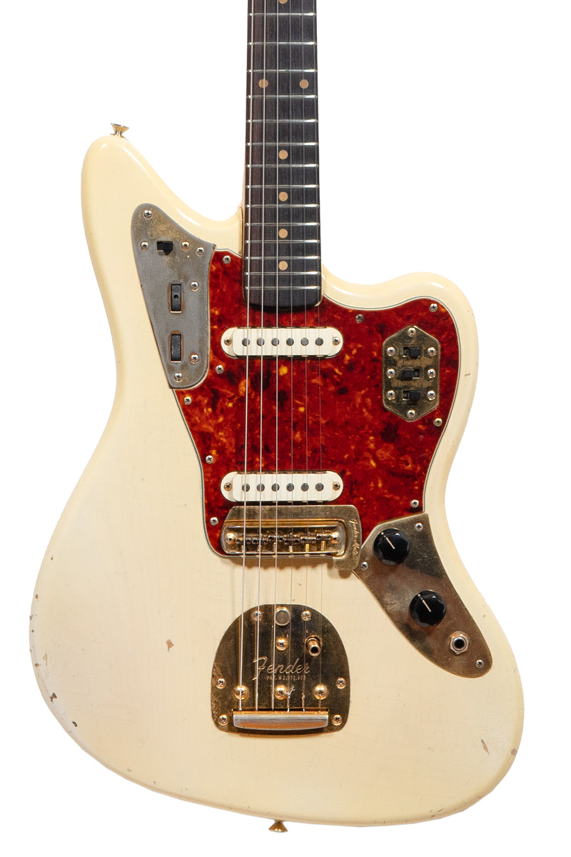 closeup of a Vintage 1963 Fender Jaguar electric guitar in white