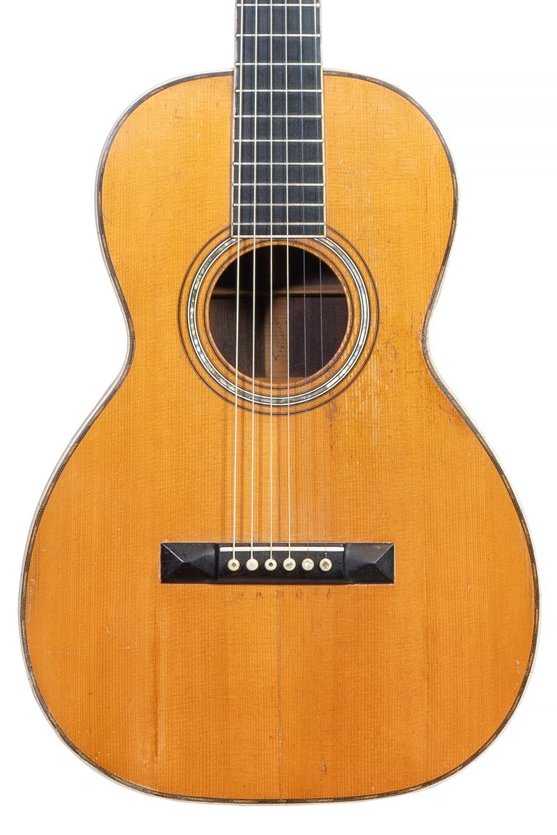 close up of Pre-war 1903 Martin 0-30 acoustic guitar