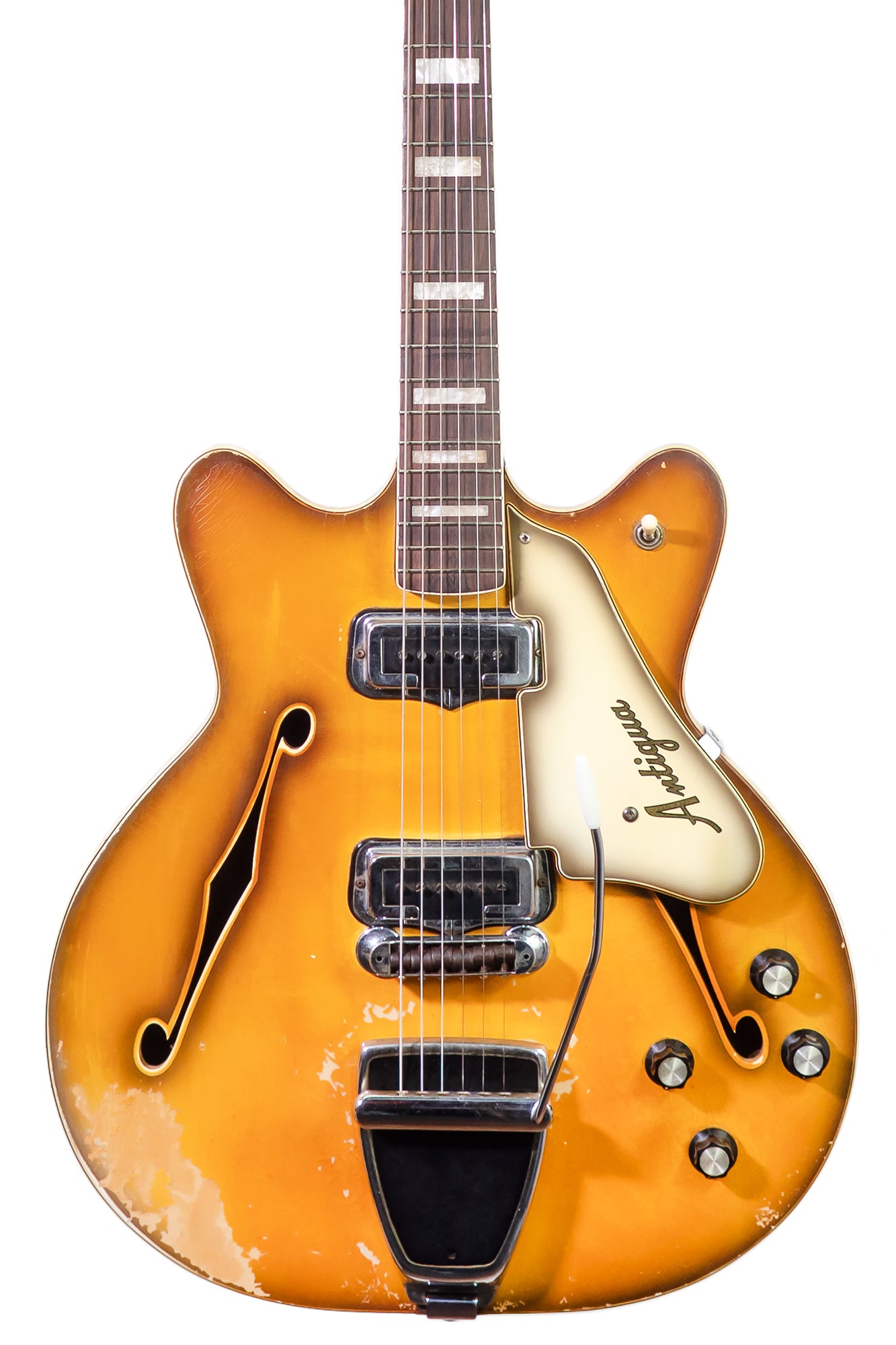 closeup of a vintage 1968 Fender Coronado electric guitar in antigua finish