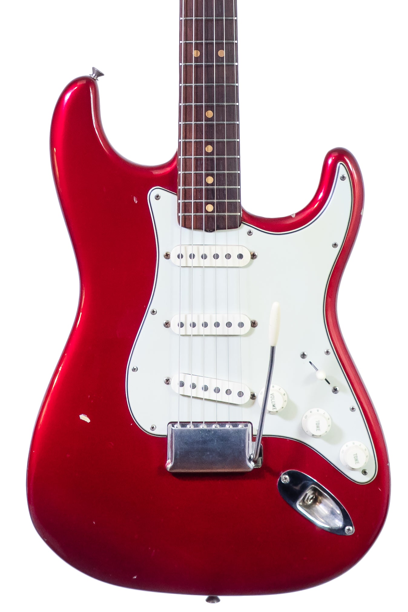 closeup of a Vintage 1965 Fender Stratocaster electric guitar in candy apple red
