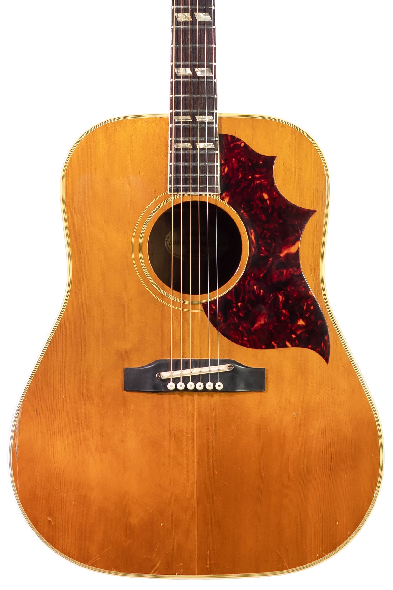 closeup of an Original 1963 Gibson Country Western acoustic guitar