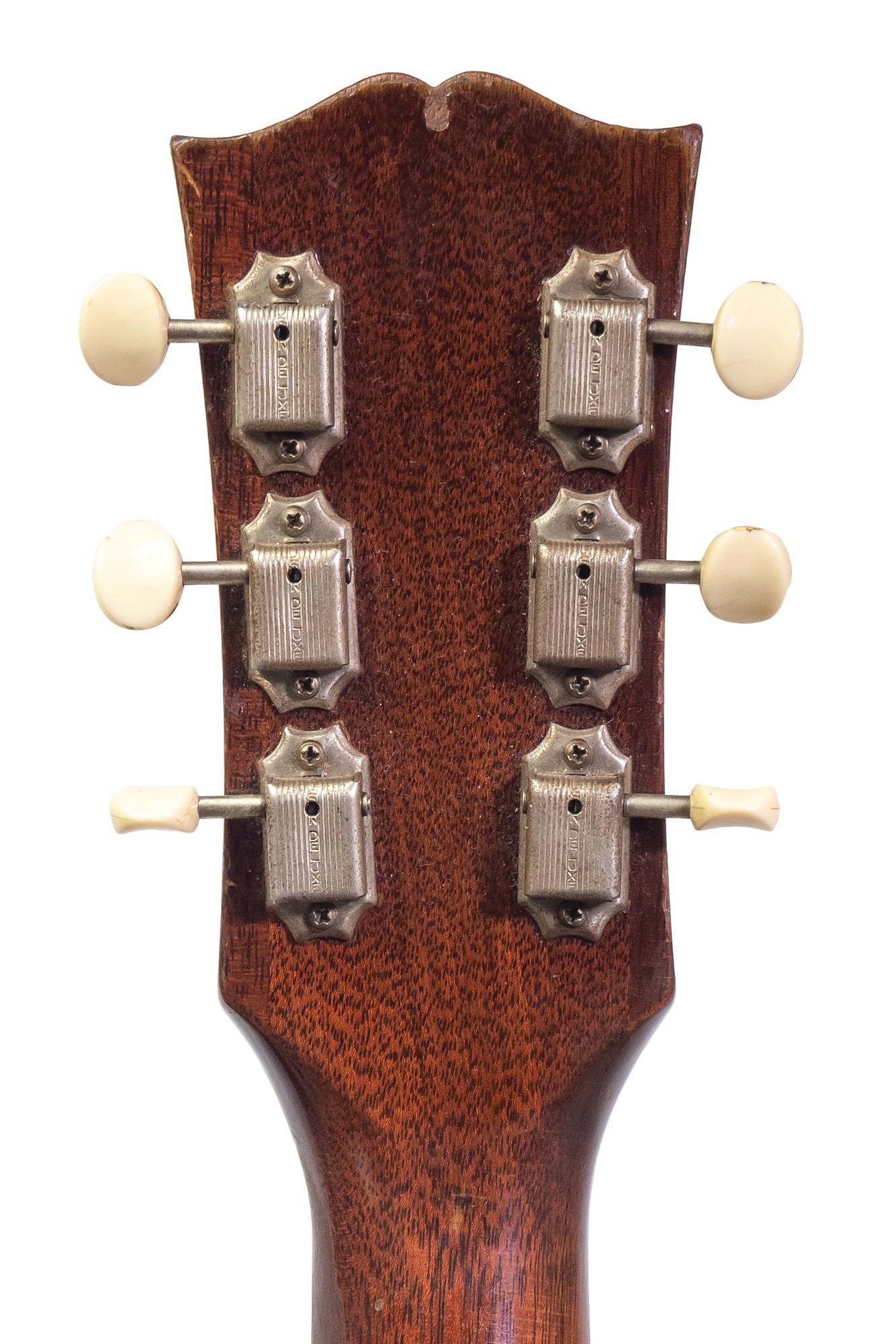 headstock and tuners from a vintage 1958 Gibson Country Western acoustic guitar