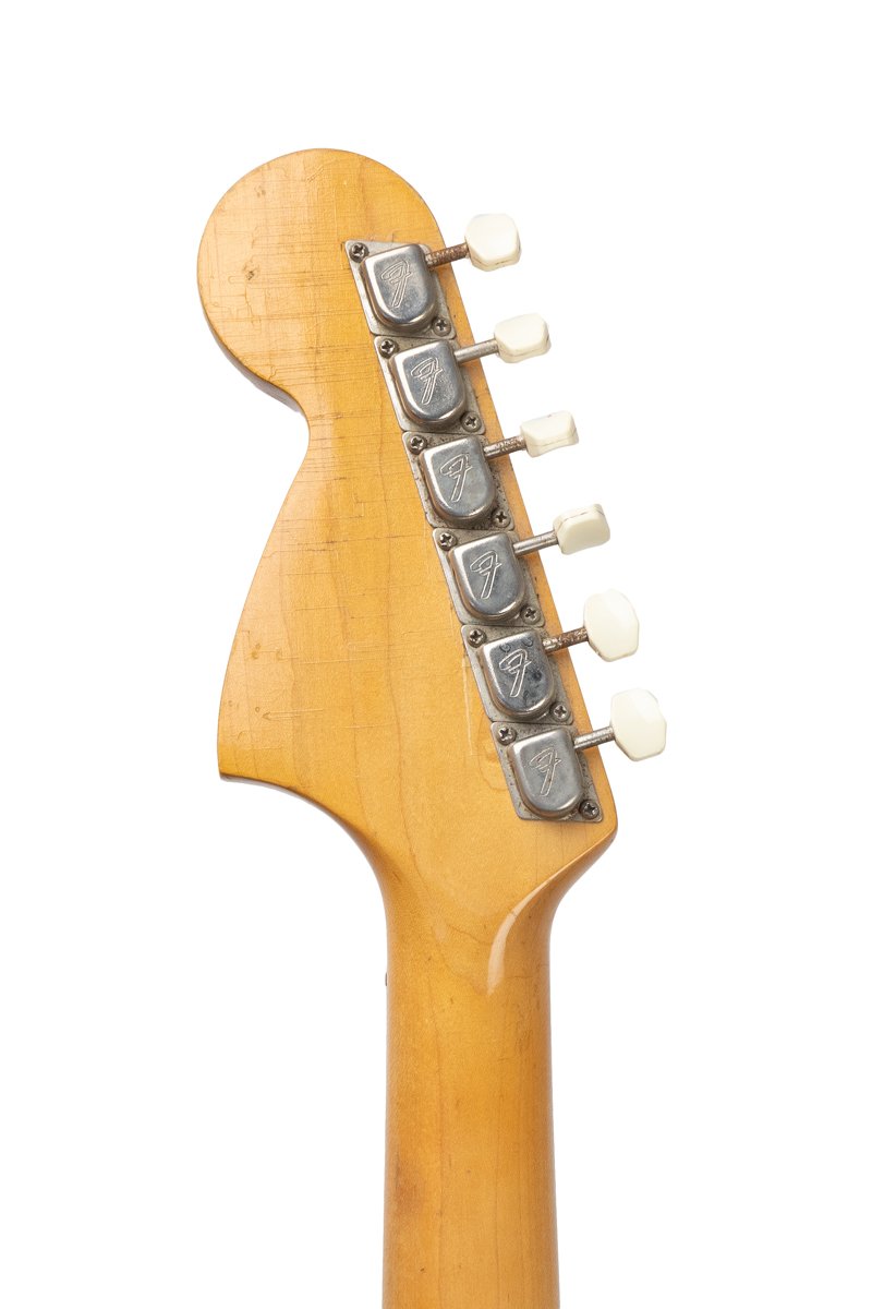 tuners from a Vintage 1966 Fender Mustang electric guitar in white