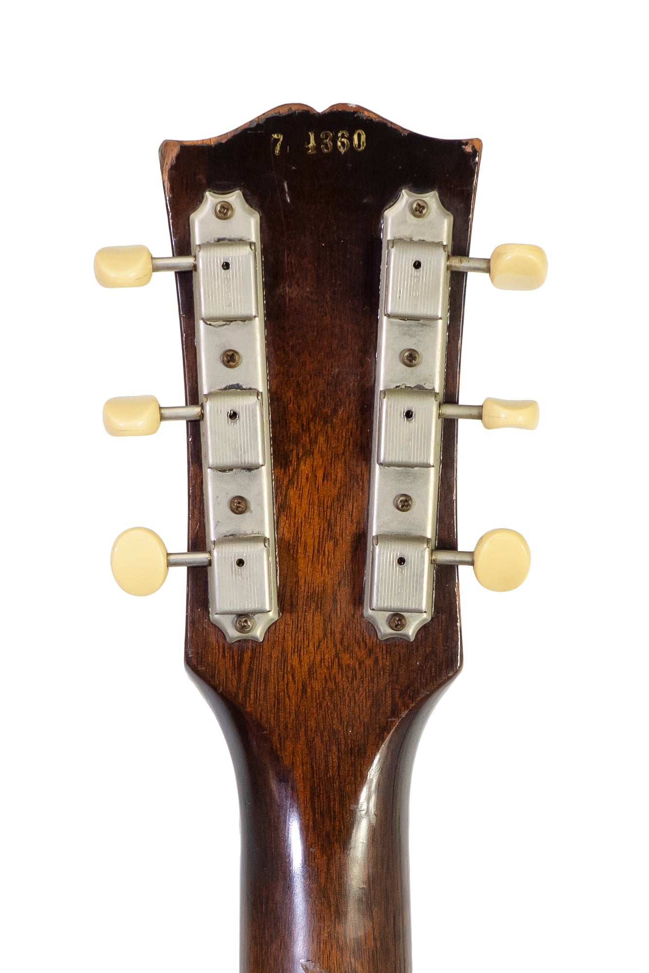 headstock and tuners from a vintage 1957 Gibson Les Paul Junior electric guitar