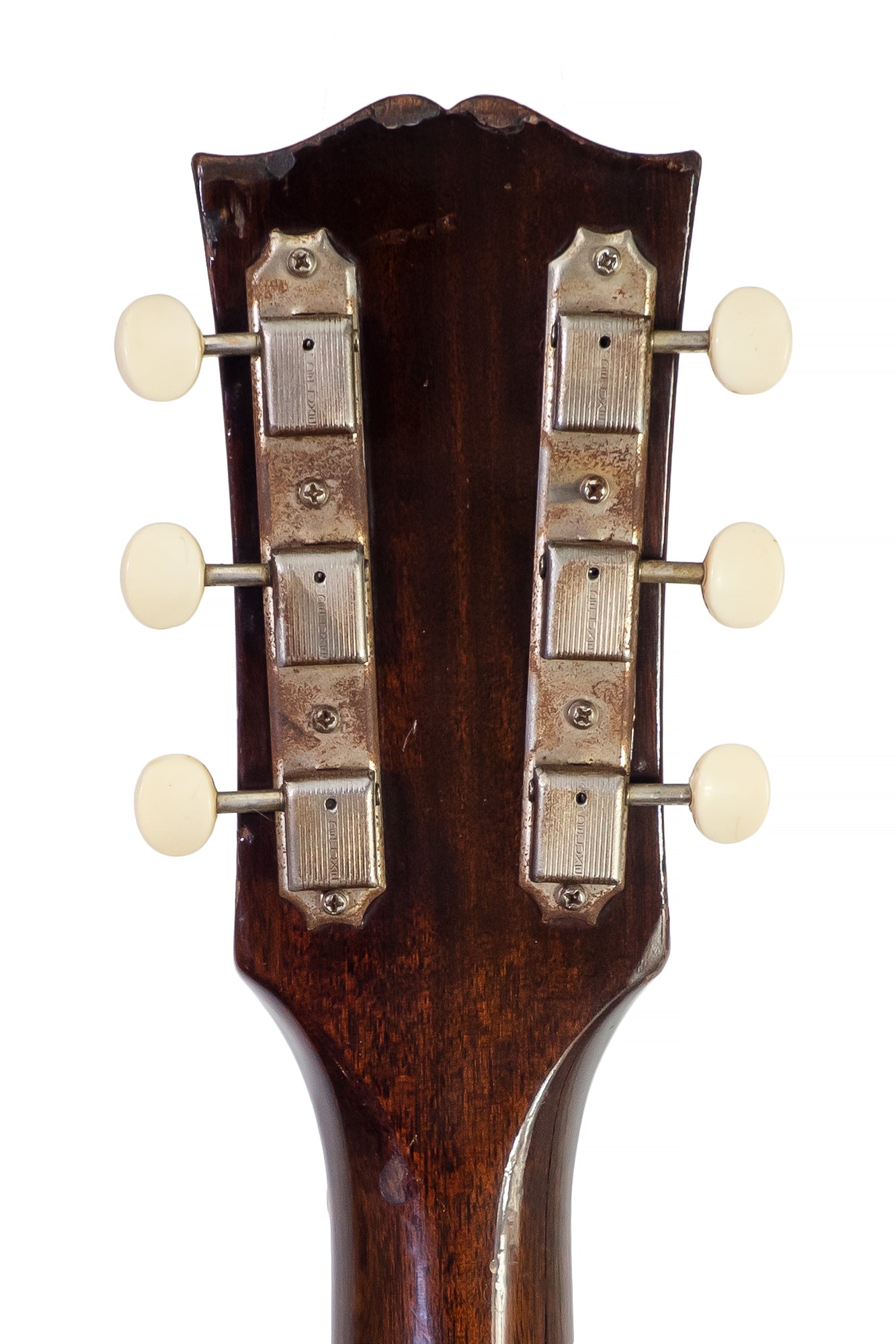 headstock and tuners from a vintage 1954 Gibson ES-140 electric archtop guitar
