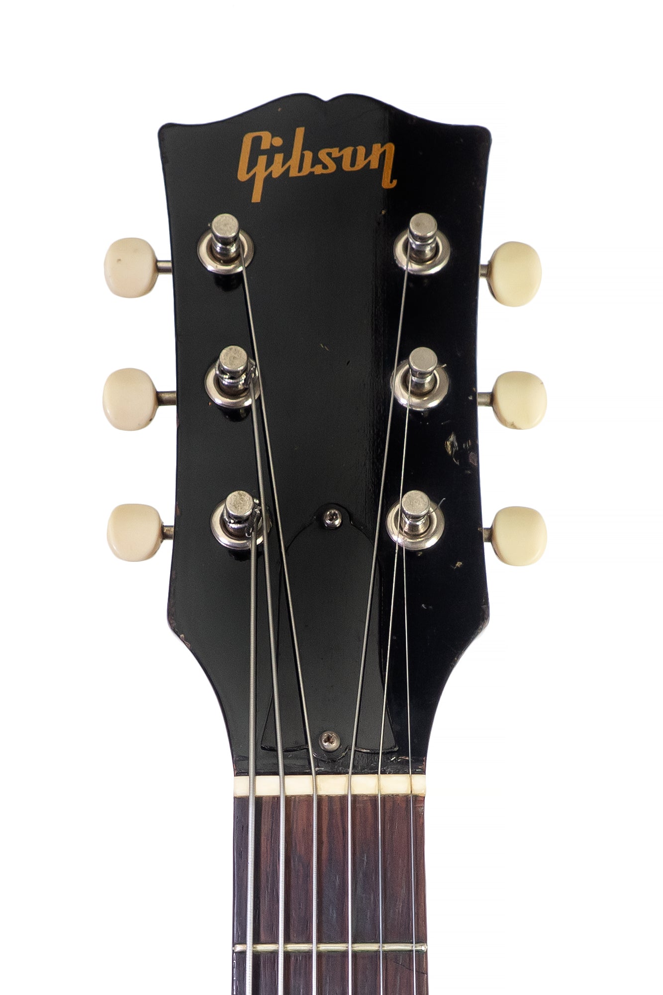 headstock of a vintage 1954 Gibson ES-140 electric archtop guitar