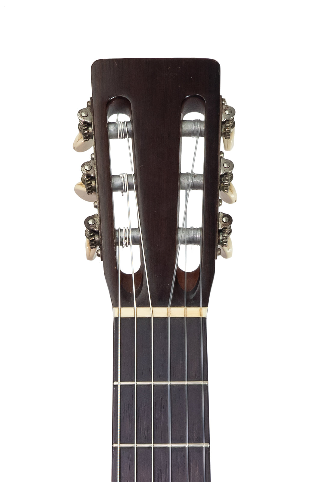 headstock from a vintage 1954 Martin 00-18G classical guitar