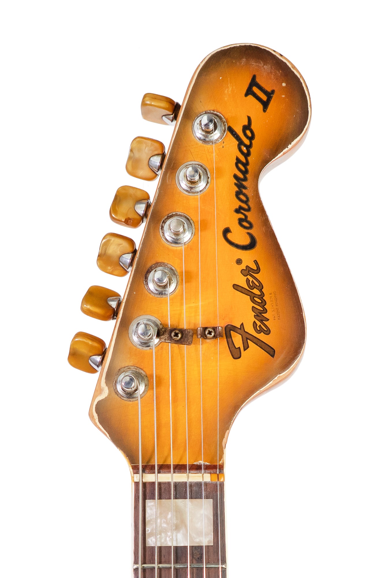 headstock from a vintage 1968 Fender Coronado electric guitar in antigua finish