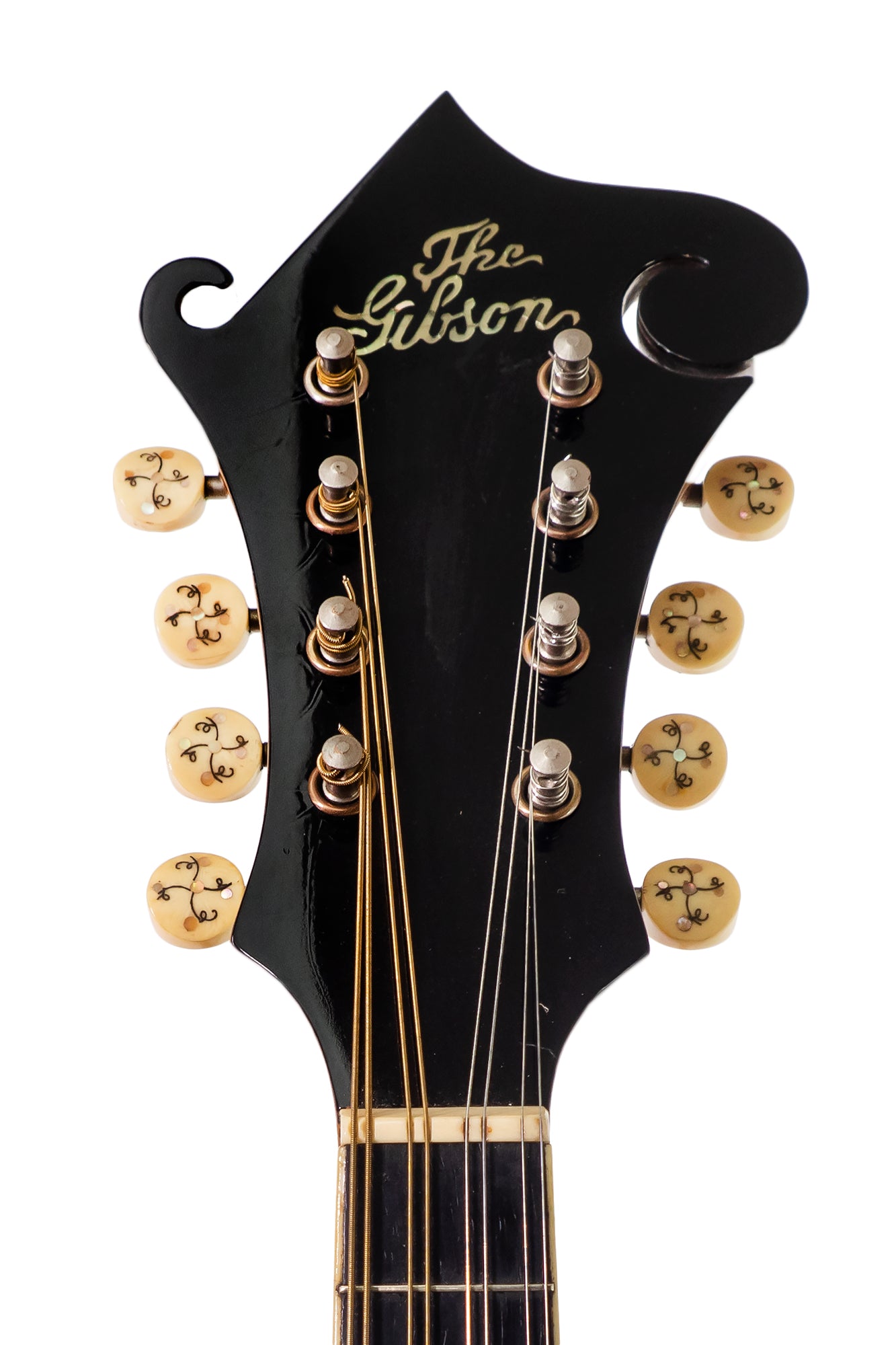 headstock of vintage 1908 Gibson F2 Mandolin