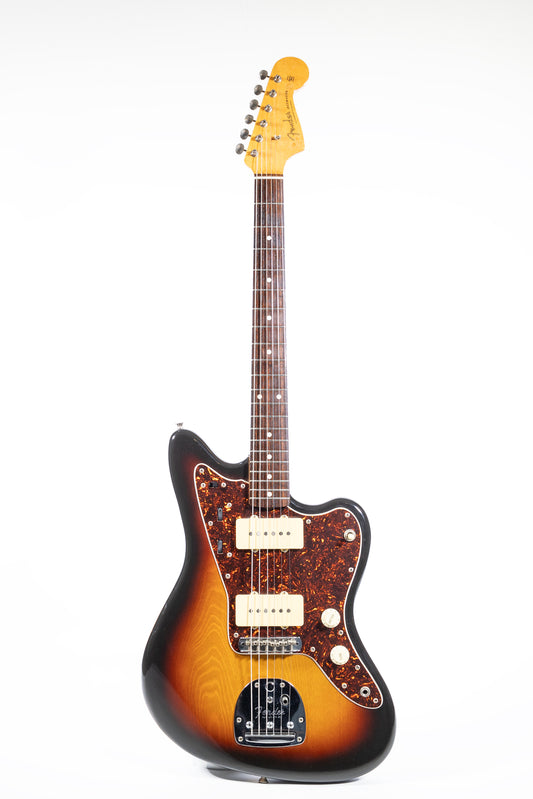 full length front of body, freatboard and headstock photograph of a 1986 Fender Jazzmaster Made in Japan finished in 3 colour Sunburst