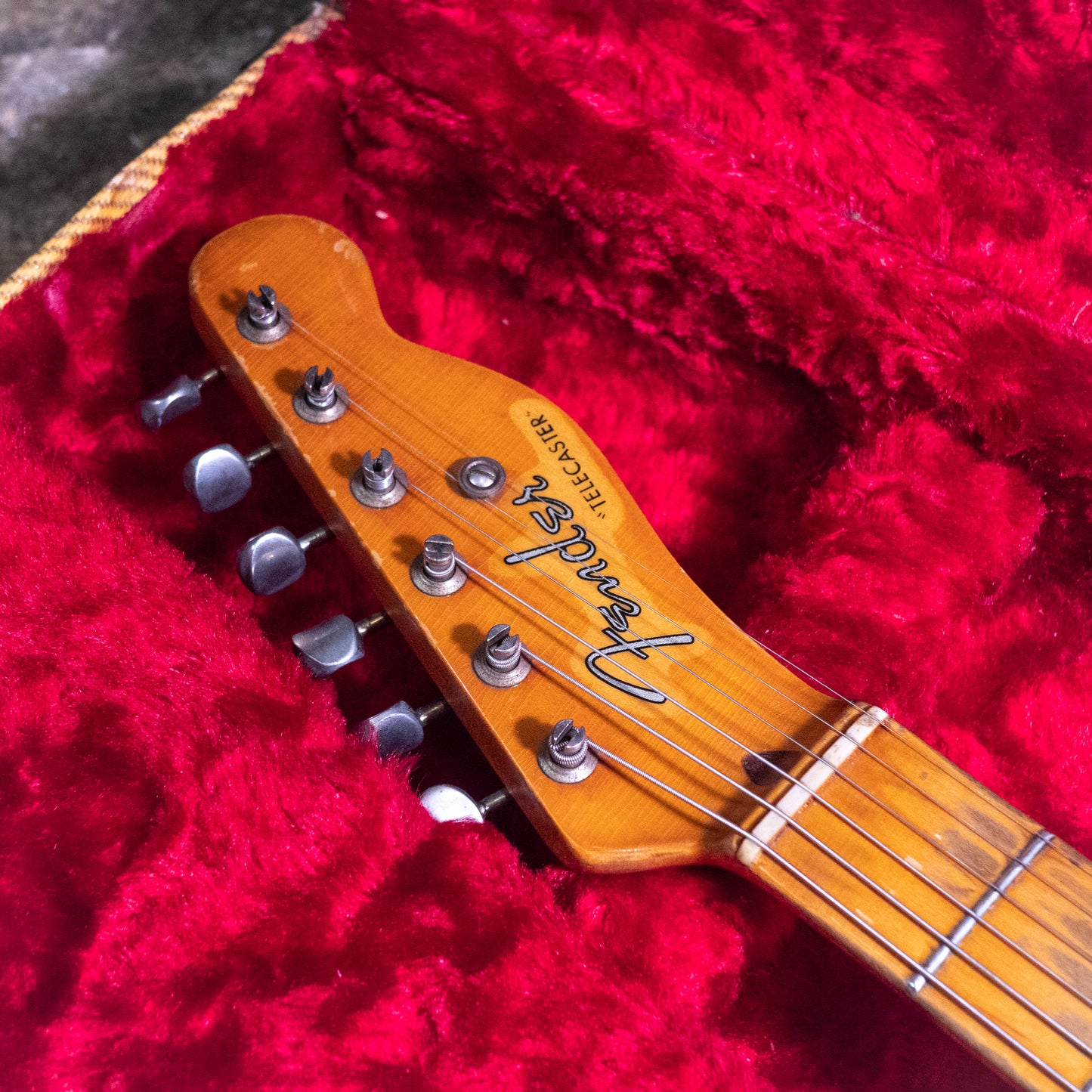 headstock from a vintage 1952 Fender Telecaster electric guitar in original case