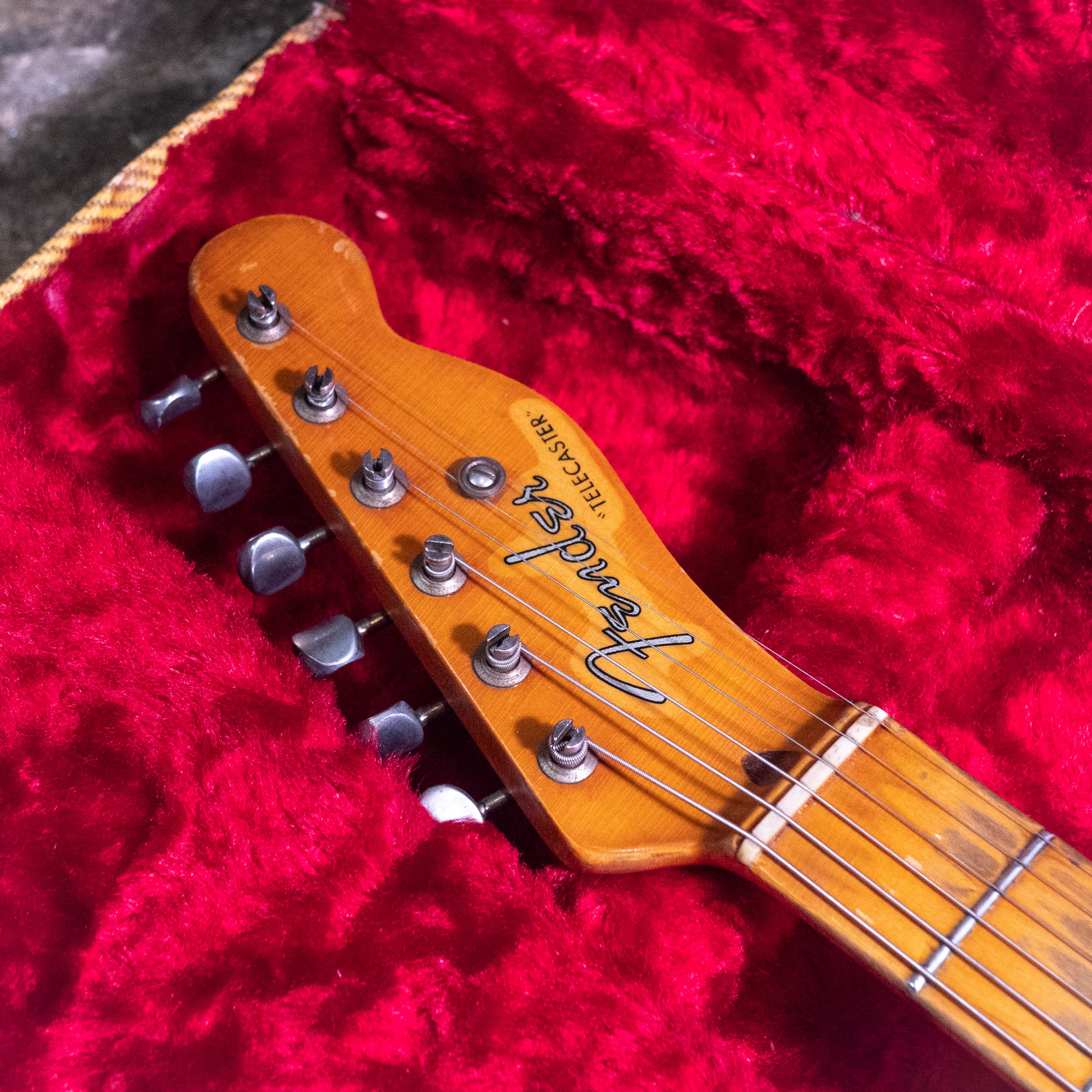 headstock from a vintage 1952 Fender Telecaster electric guitar in original case