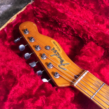 headstock from a vintage 1952 Fender Telecaster electric guitar in original case