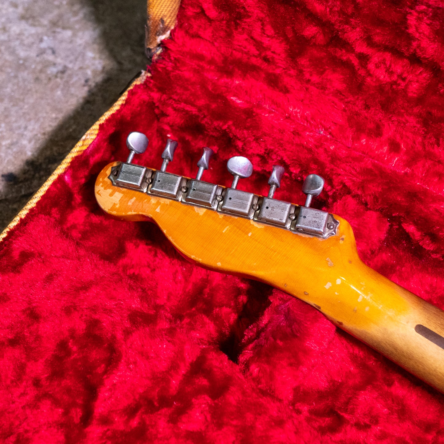 headstock and tuners from a vintage 1952 Fender Telecaster electric guitar