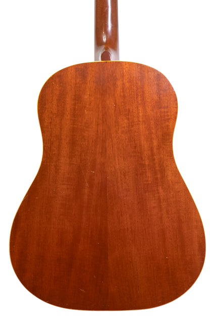 mahogany back of a Vintage 1941 Gibson J-55 acoustic guitar