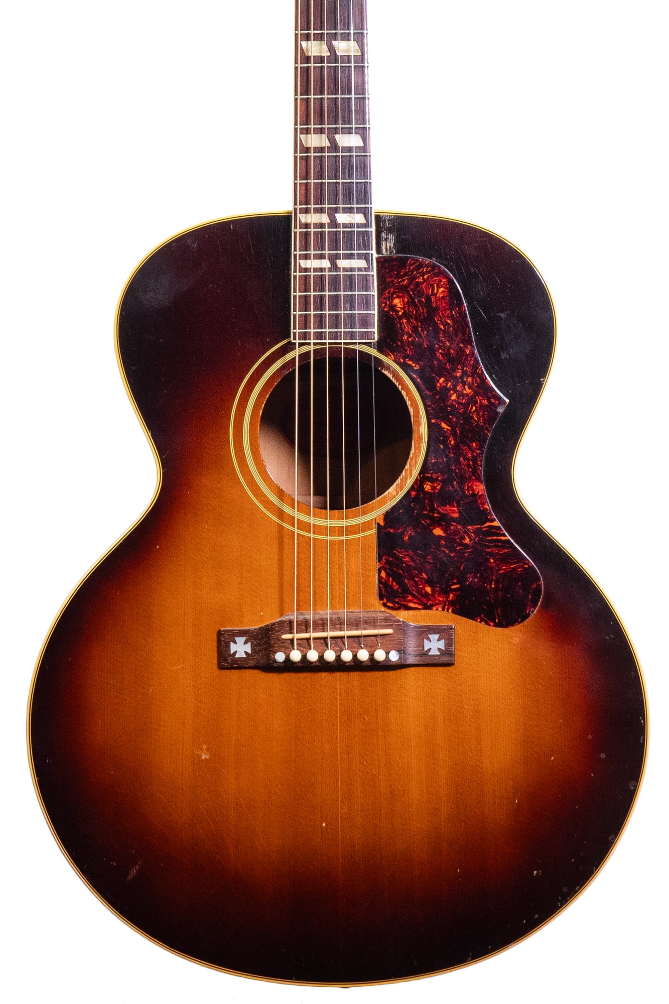 closeup of a vintage 1957 Gibson J-185 jumbo acoustic guitar