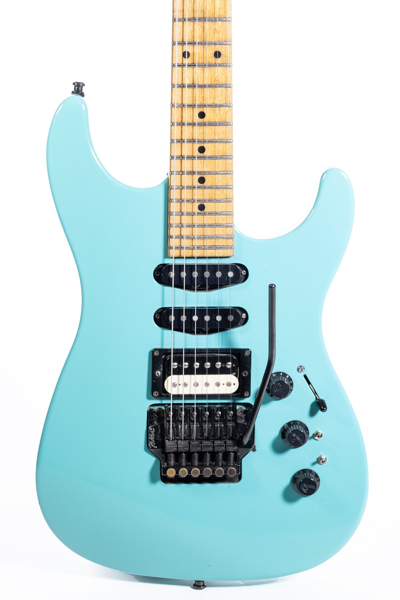 closeup of a Vintage 1989 Fender Heavy Metal Stratocaster in blue