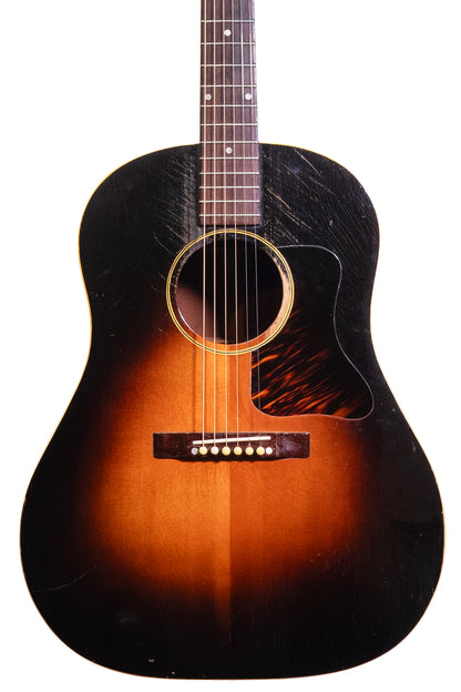 closeup of a vintage 1940 Gibson J-35 acoustic guitar