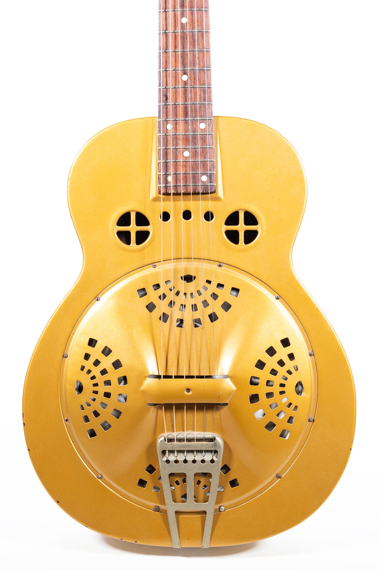 closeup from the front of a vintage 1936 Dobro Model 32 hawaiian blues guitar in gold