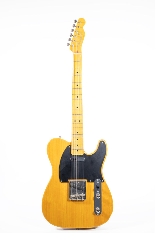 full length photo showing the front of the neck and body of a 2007 Fender '52 Reissue blackguard Telecaster Made In Japan