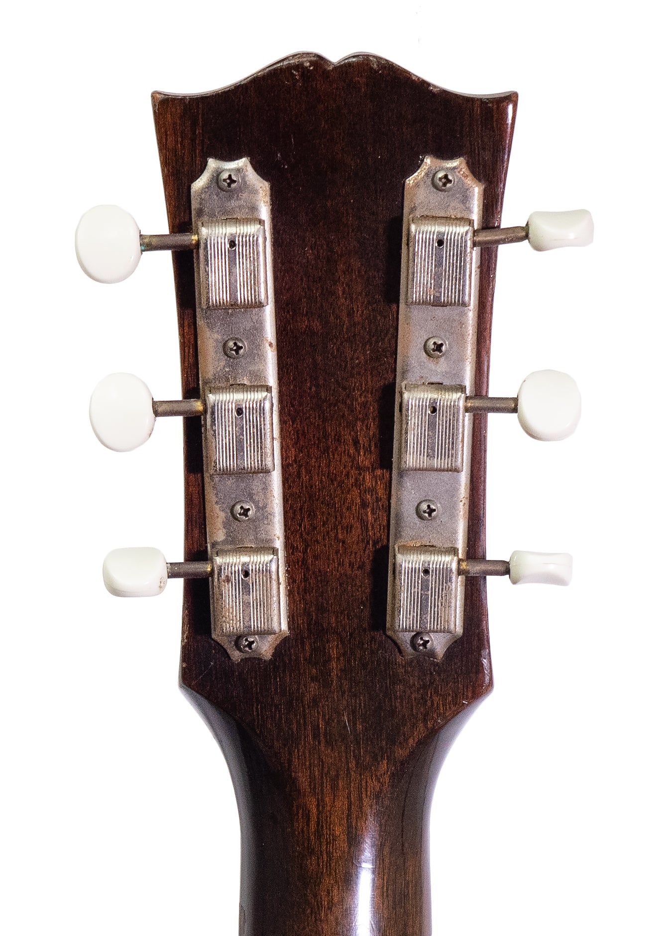 headstock and tuners from a vintage 1952 Gibson ES-125 electric archtop guitar