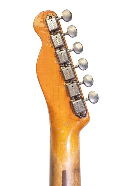 headstock and tuners from a vintage 1952 Fender Telecaster electric guitar