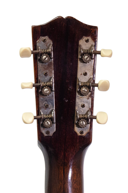 tuners from a vintage 1940 Gibson J-35 acoustic guitar