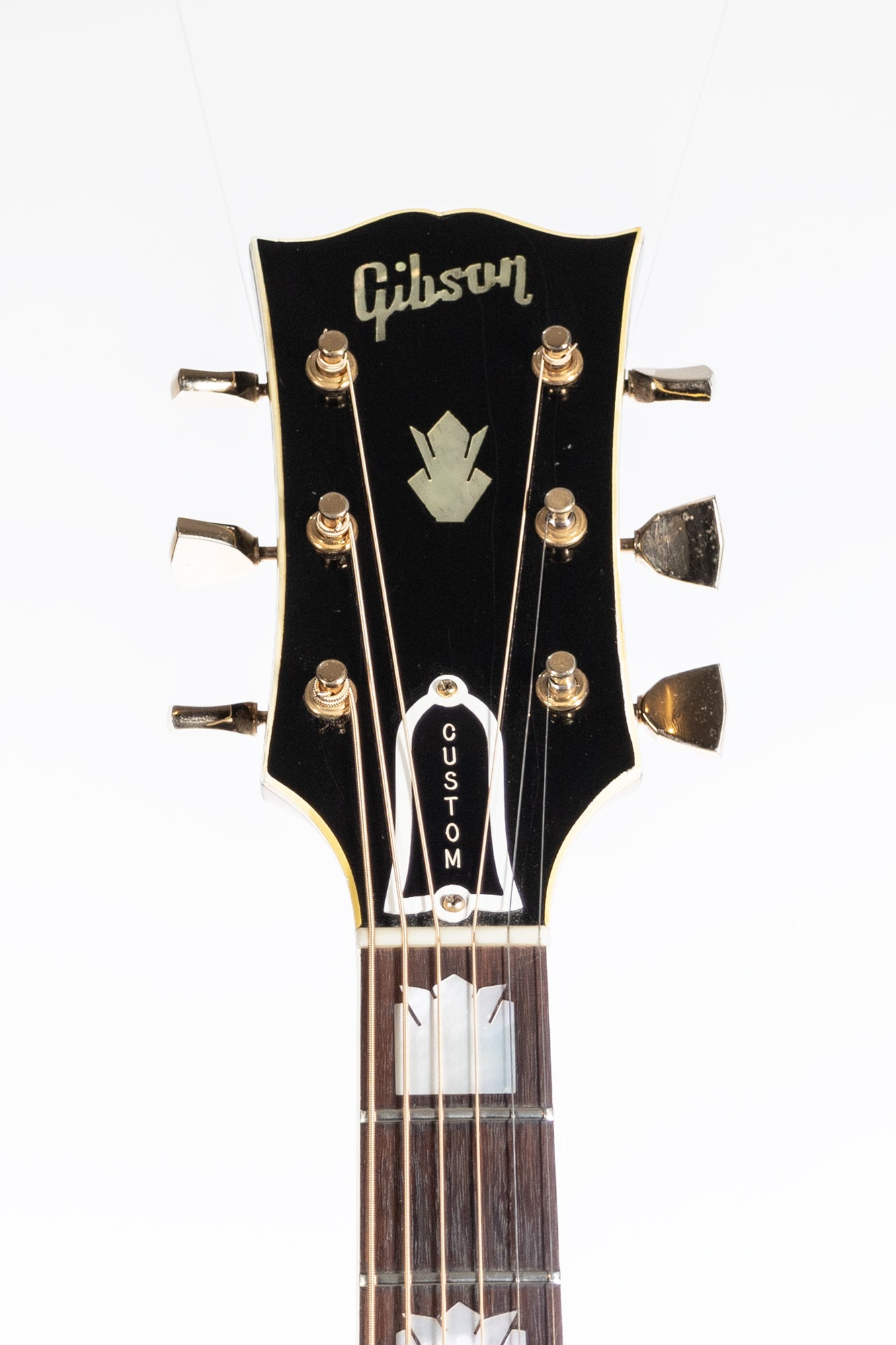 headstock from a VIntage 1966 Gibson J-200 acoustic guitar in blonde