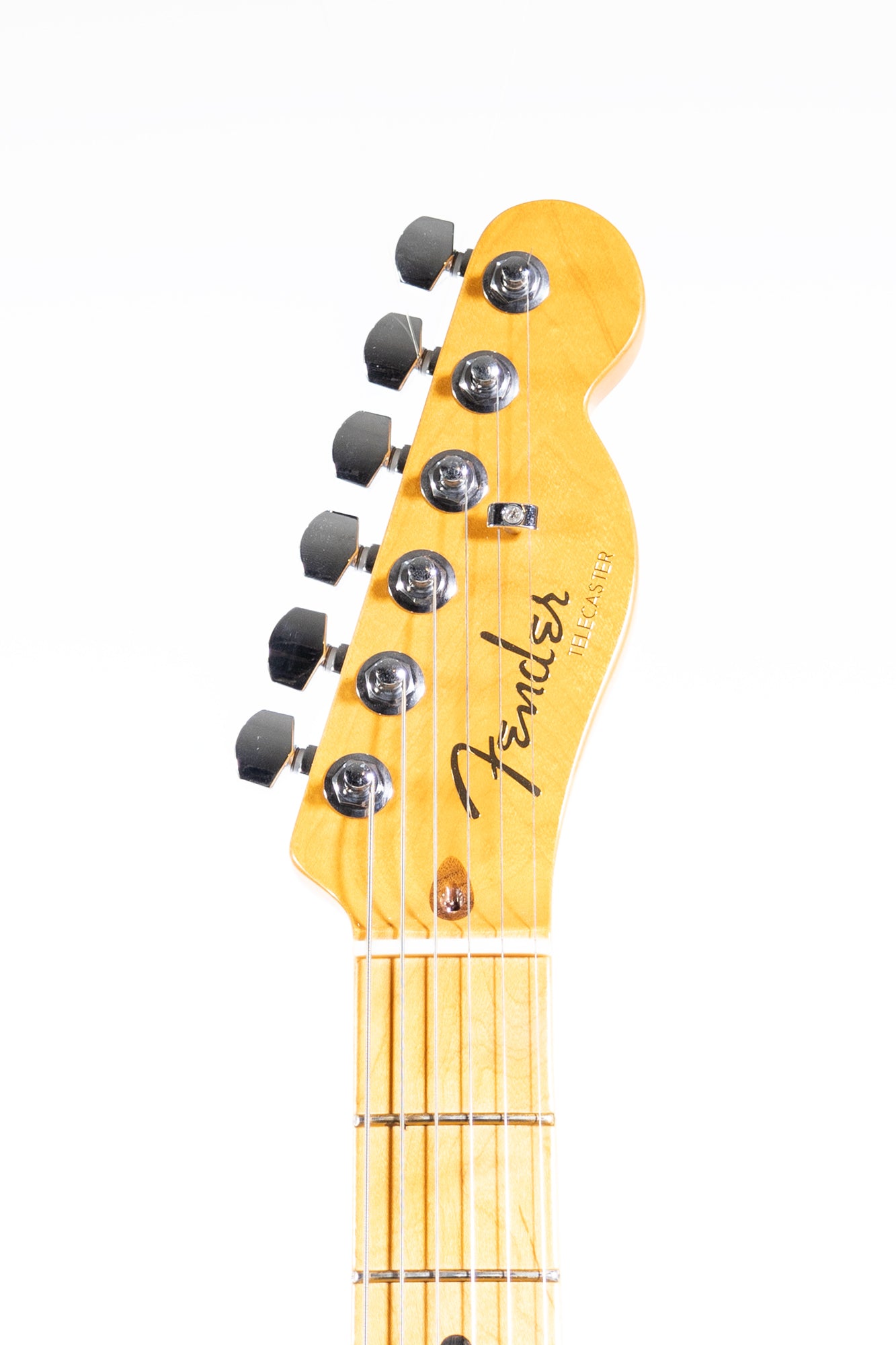 headstock front of a Fender American Ultra Telecaster, maple neck and fretboard, spaghetti headstock logo