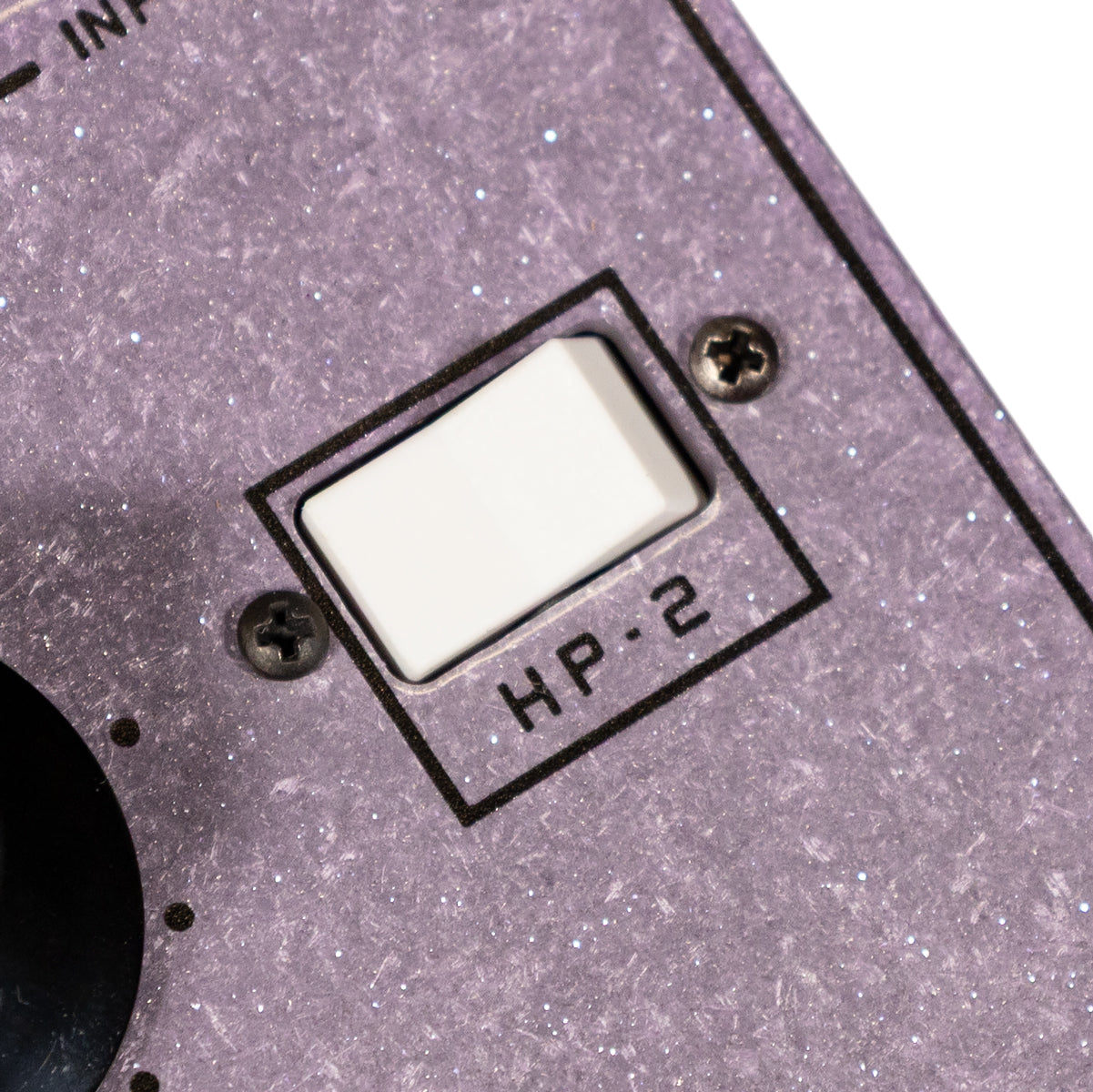 Land Devices HP-2 distortion pedal in Lilac Sparkle finish, switch close up