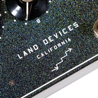 Land Devices HP Distortion in Cosmos multi colour sparkle finish 'Land Devices California' logo close up