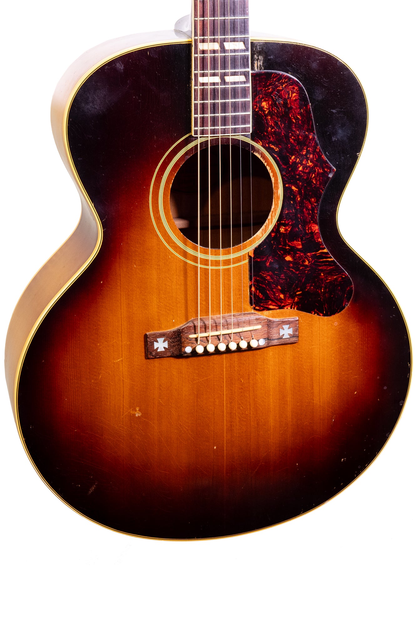 closeup of a vintage 1957 Gibson J-185 jumbo acoustic guitar