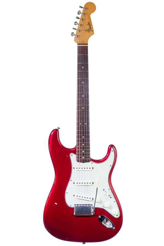 Vintage 1965 Fender Stratocaster electric guitar in candy apple red