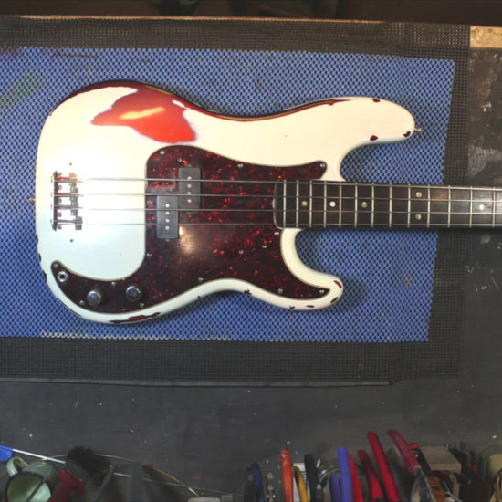 vintage 1966 Fender Precision Bass guitar in red restoration video
